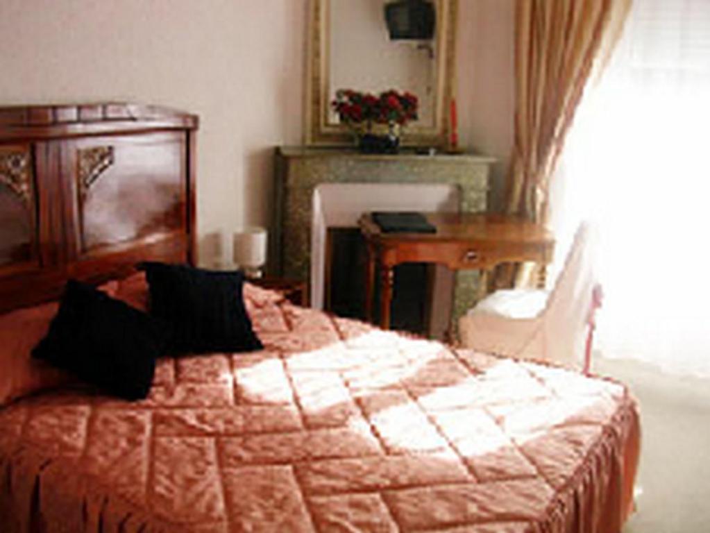 Arcantis Hotel Metropole Châtel-Guyon Quarto foto